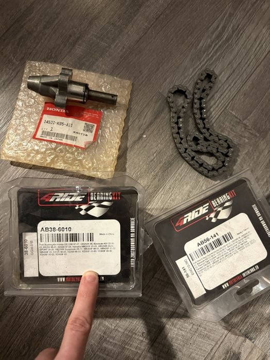 Czesci motocross, napinacz, lancuszek rozrzadu itp.