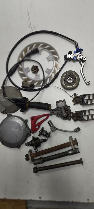 Kawasaki kx 125 ośka dekiel wałek Magneto tarcza rolgaz chłodnica