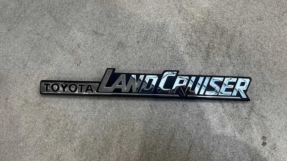 Emblemat Toyota Land Cruiser HZJ79