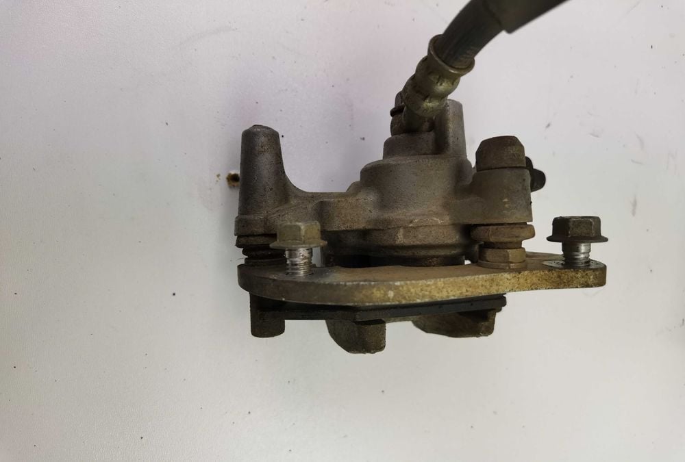 Zacisk przód prawy/lewy yamaha raptor 250, 07r