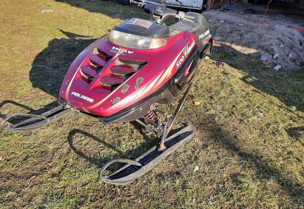 Skuter śnieżny Polaris Indy części płozy gąsienica wózek wydech lampa