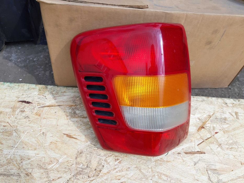 Lampa lewa Jeep Grand Cherokee WJ oryginał