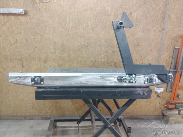 Pevnostný nárazník, držiak rezervy