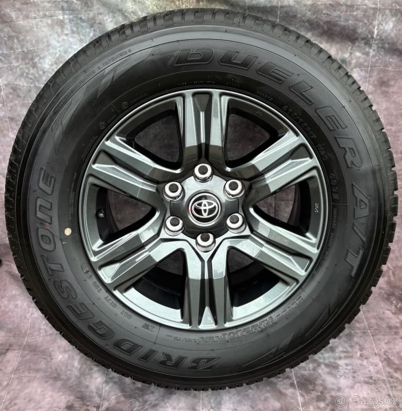 Zánovní alu Toyota Hilux 265/65R17 112S 99% VZORKU