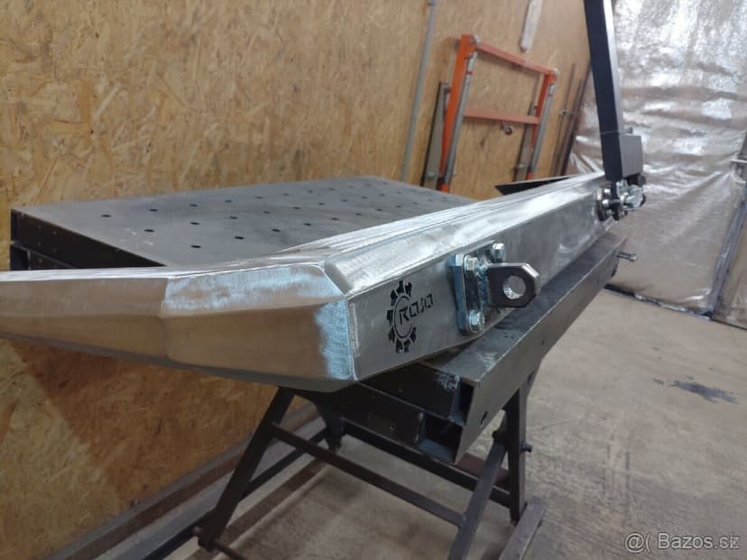 Pevnostný nárazník, držiak rezervy